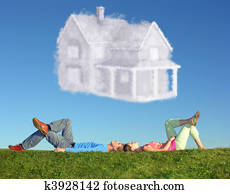 lying couple on grass and dream house collage