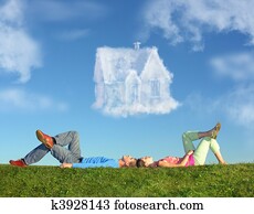 lying couple on grass and dream house collage
