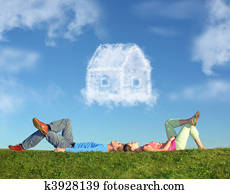 lying couple on grass and dream house collage