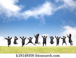 College students celebrate graduation and happy jump College students celebrate graduation and happy jump