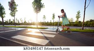 girl on a scooter girl on a scooter