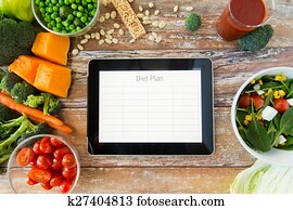 Grand plan, de, régime alimentaire, sur, tablette pc, et, légumes Grand plan, de, régime alimentaire, sur, tablette pc, et, légumes