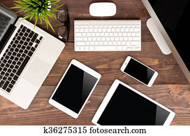 communicator technology on wood table top view communicator technology on wood table top view