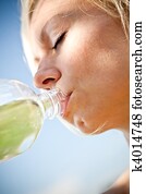 Woman drinking water Woman drinking water