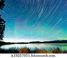 Startrails Aurora borealis display Lake Laberge