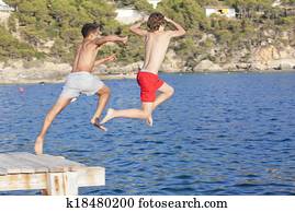 summer camp kids jumping in sea summer camp kids jumping in sea