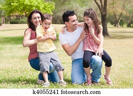 Happy family enjoying in a park