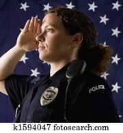 Policewoman saluting.