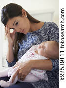Tired Mother Suffering From Post Natal Depression Tired Mother Suffering From Post Natal Depression