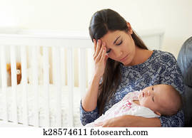 Tired Mother Suffering From Post Natal Depression Tired Mother Suffering From Post Natal Depression