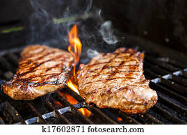 Steaks on barbecue Steaks on barbecue