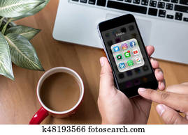 BANGKOK, THAILAND - JUNE 9th, 2017 : man using Iphone social media on screen life style to Share Social Media in News Feed BANGKOK, THAILAND - JUNE 9th, 2017 : man using Iphone social media on screen life style to Share Social Media in News Feed