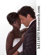 happy new wed interracial couple in wedding mood