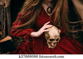 Young witch in the autumn forest Young witch in the autumn forest