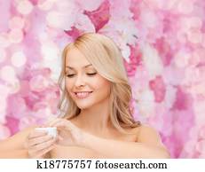 beautiful woman applying cream beautiful woman applying cream