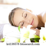 relaxed woman getting spa treatment