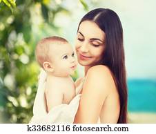 happy mother with adorable baby happy mother with adorable baby