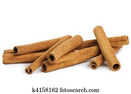 some cinnamon sticks on white background