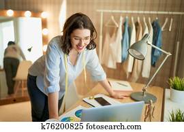 Woman is working at workshop Woman is working at workshop