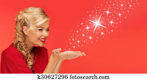 woman sending stars from palms of her hands woman sending stars from palms of her hands