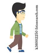 Smiling businessman walking