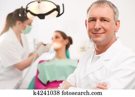 Dentist in his surgery