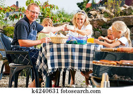 Family having a barbecue party Family having a barbecue party