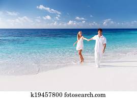 Happy couple on the beach