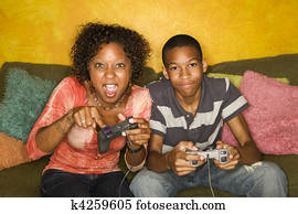 African-American family playing video game