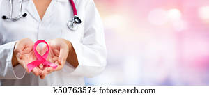 Doctor Hands Holding Pink Cancer Awareness Ribbon Doctor Hands Holding Pink Cancer Awareness Ribbon