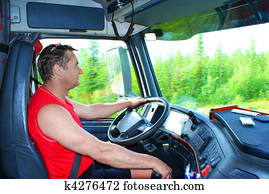 The driver at the wheel of the truck