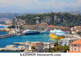 Harbor with luxury yachts, cruise ships of the city of Nice, France.