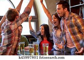 football fans or friends with beer at sport bar football fans or friends with beer at sport bar