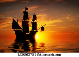 Old ancient pirate ship on peaceful ocean at sunset. Old ancient pirate ship on peaceful ocean at sunset.