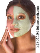 Woman in beauty spa experimental facial treatment Woman in beauty spa experimental facial treatment