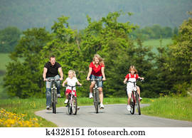 Family riding bicycles