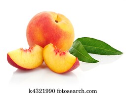 fresh peach fruits with green leaves