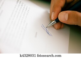 Man signing a contract
