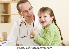 Pediatrician doctor with child patient Pediatrician doctor with child patient