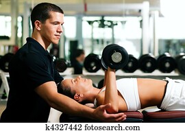 Personal Trainer in gym Personal Trainer in gym