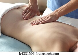 female receiving back massage - clo