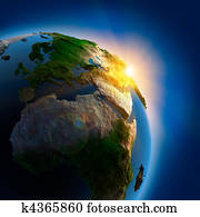 Sunrise over the Earth in outer space