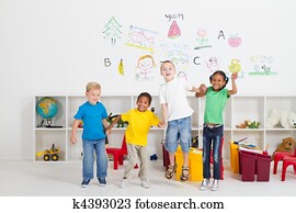 cheerful preschool kids jumping cheerful preschool kids jumping