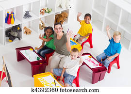 preschool teacher and kids