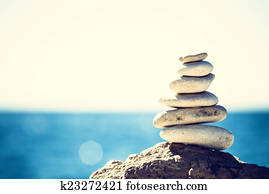Stones balance, vintage pebbles stack background