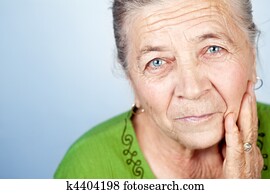 Face of content beautiful old senior woman