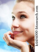 Pensive happy beautiful young woman 