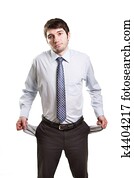 Sad and broke businessman with empty pockets Sad and broke businessman with empty pockets