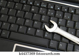pc keyboard and wrench- computer repair pc keyboard and wrench- computer repair