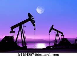 oil pumps at night